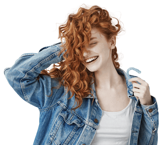 Happy women with curly hair holding clear aligner | OrthoFx