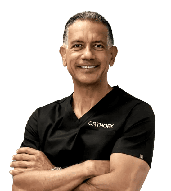 Orthofx doctor with folded hand | OrthoFx